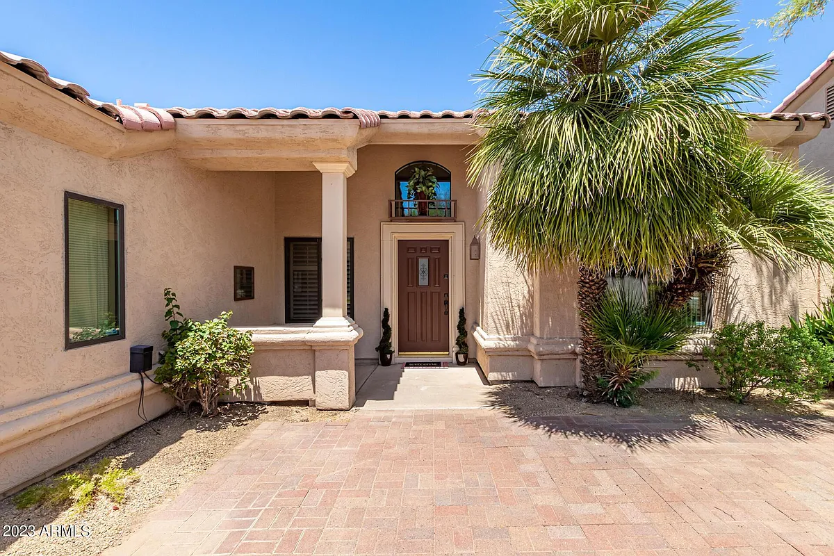Building Photo - 9018 E Caribbean Ln