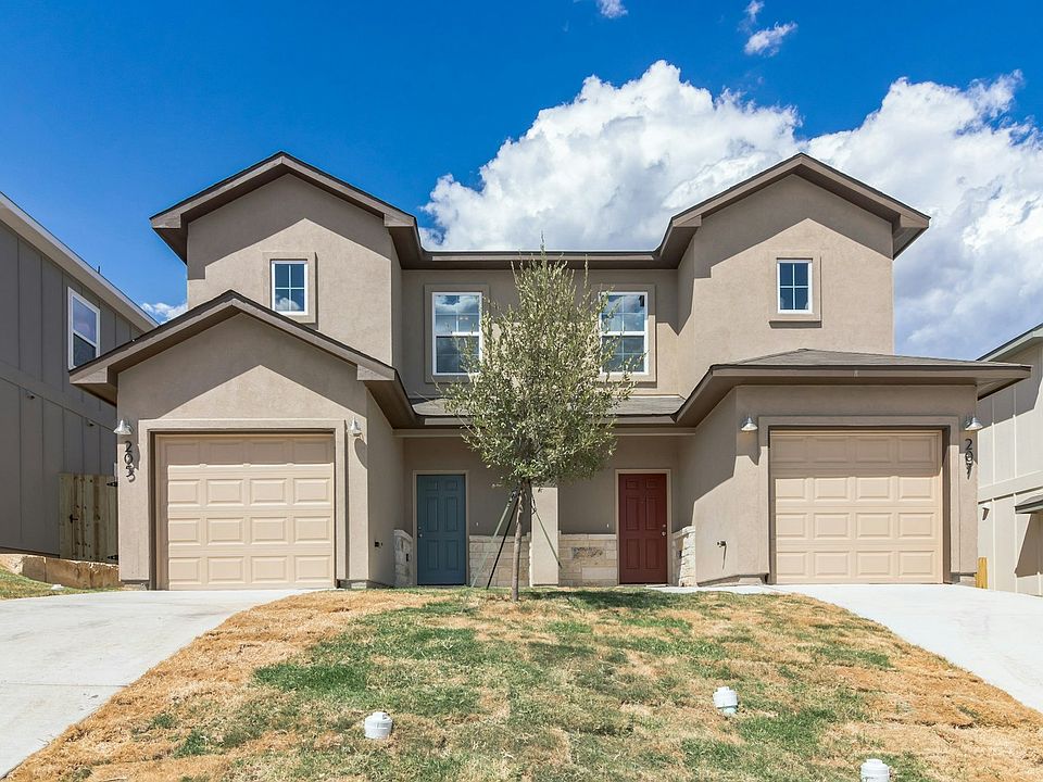 Pictures of our another home in the community that was completed. Home will be identical to this one. Townhome is under construction and will be completed in September.