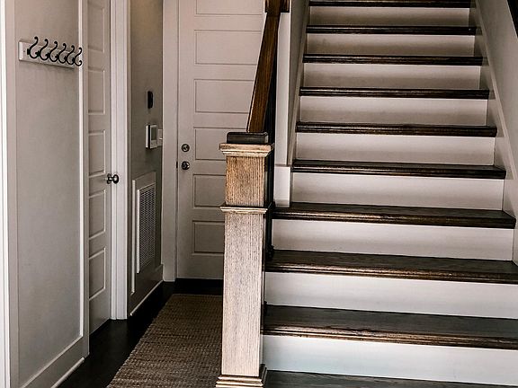 Foyer area from the front door. The door in the background leads into the garage.