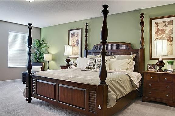 A spacious personal retreat with enough room for a King's bedroom furniture and a sitting area.