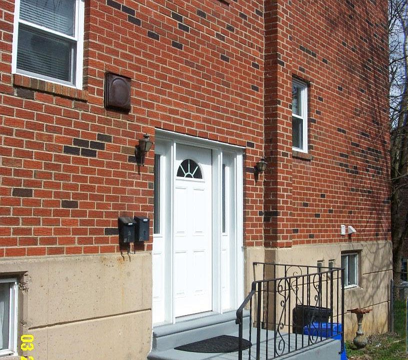 New front door and painted stairs.
