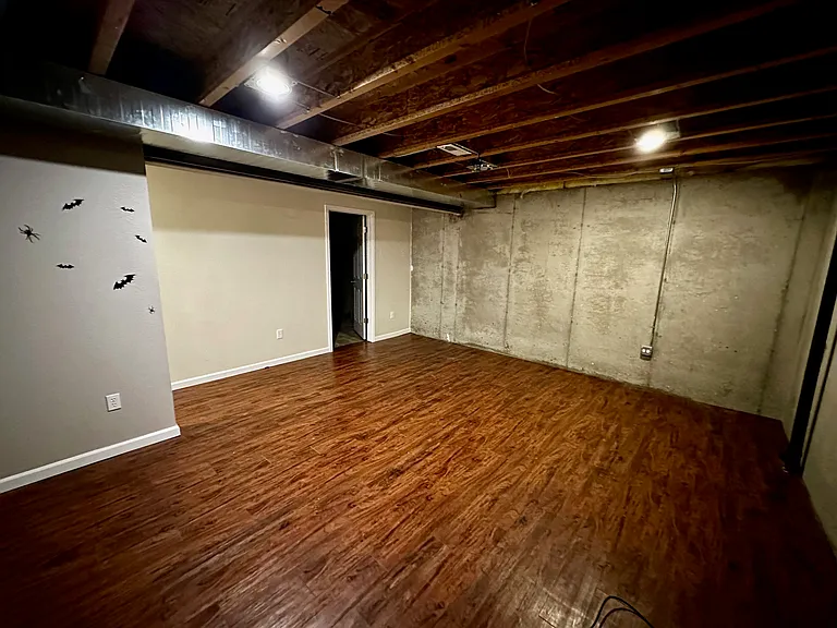 Downstairs living space - great for a TV room, game room, arts & crafts room
