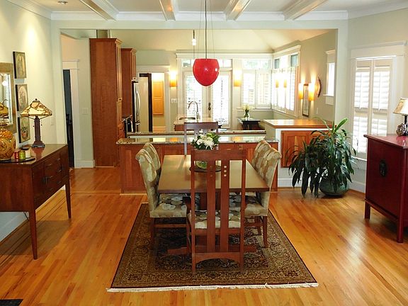 Spacious Dining Room w art wall and art lighting