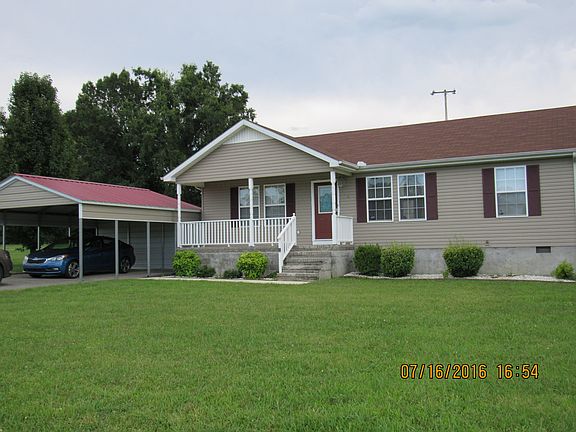 Double carport & paved drive