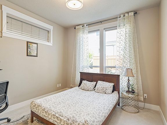 Main level bedroom with walk-in closet