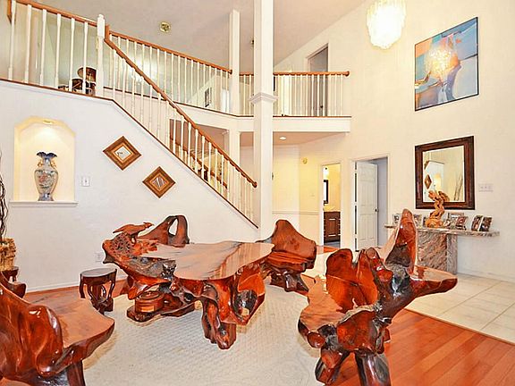 View of the living room with fantastic staircase.
