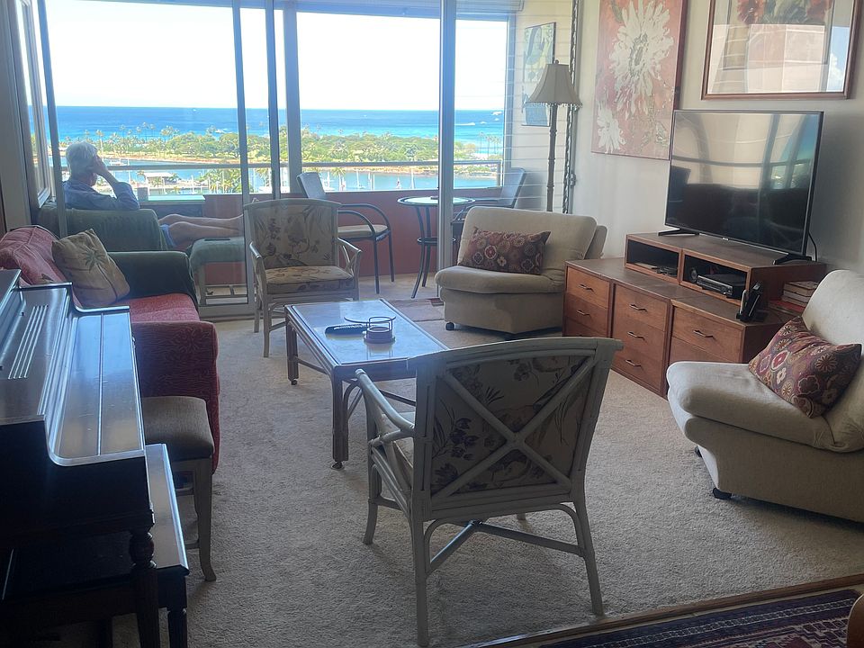 Living room showing lanai and view.