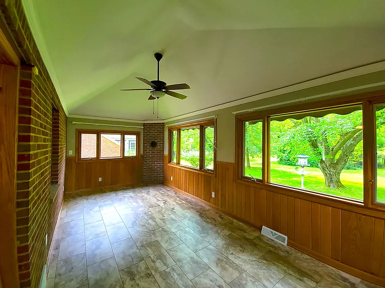 Back room addition overlooking large wooded yard