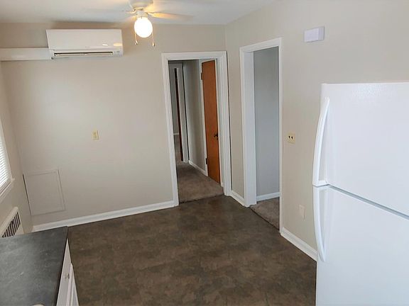 Other view of kitchen looking down the hall to the kitchen and bathroom.