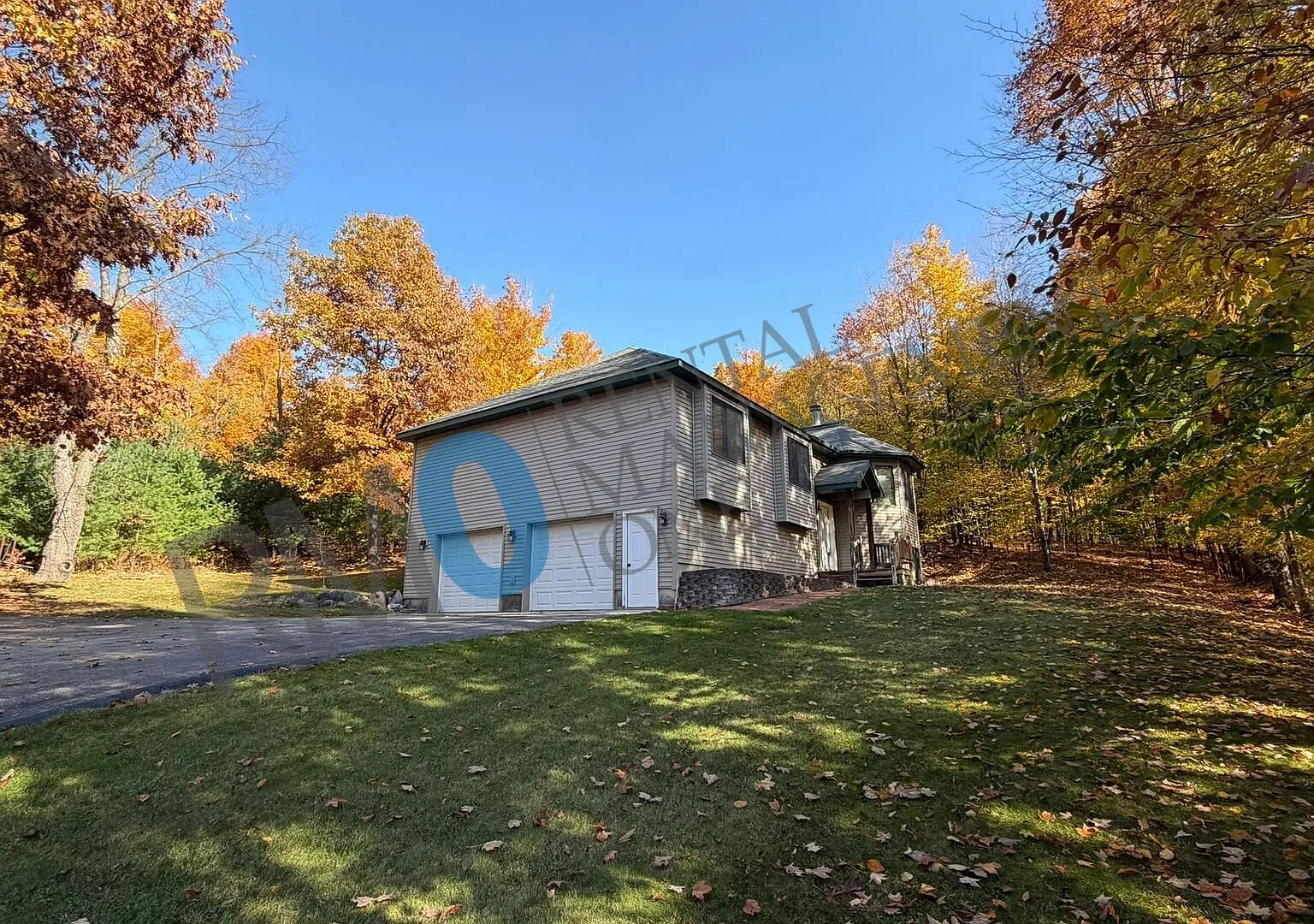 3-Bedroom Home with Basement & Wooded Setting — Photo 1