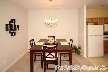 Dining Room with Decorative Chandelier