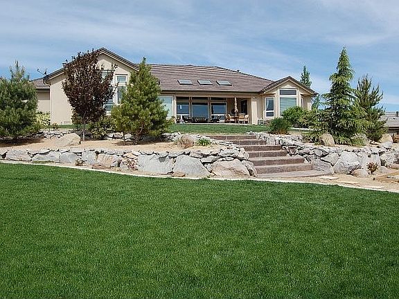 Large backyard with plenty of evening shade!