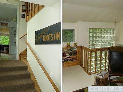 House entry and second-floor sitting room looking back at huge glass block window.