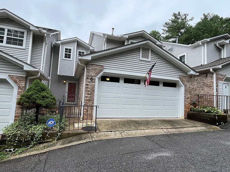 Double car garage with privacy windows.