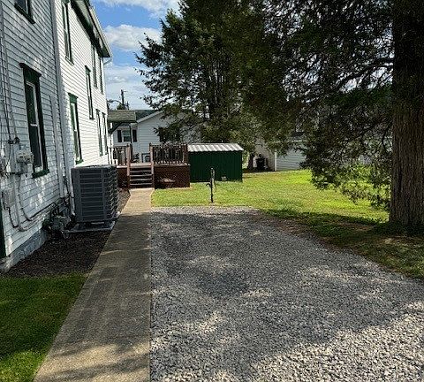 Front of house with 2 car driveway