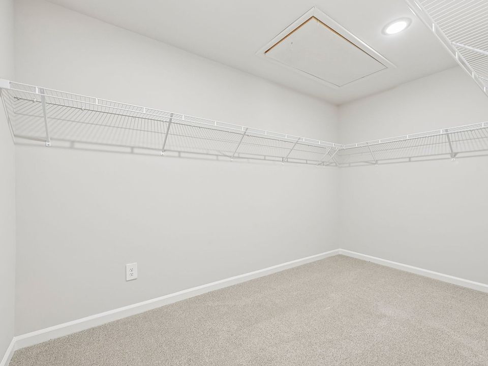 Walk-in closet in the Chatham floorplan at a Meritage Homes community in Garner, NC.