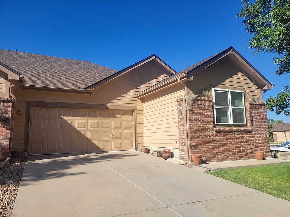 Good size attached garage with a ramp inside for an entrance into the kitchen area