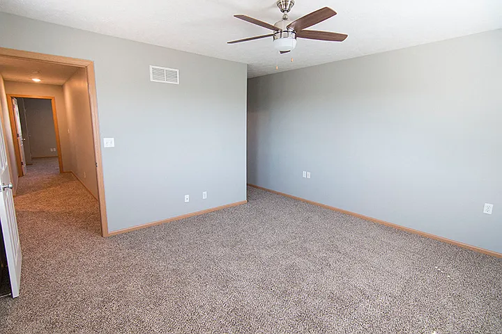 Experience ultimate comfort and relaxation in this expansive and inviting bedroom sanctuary.