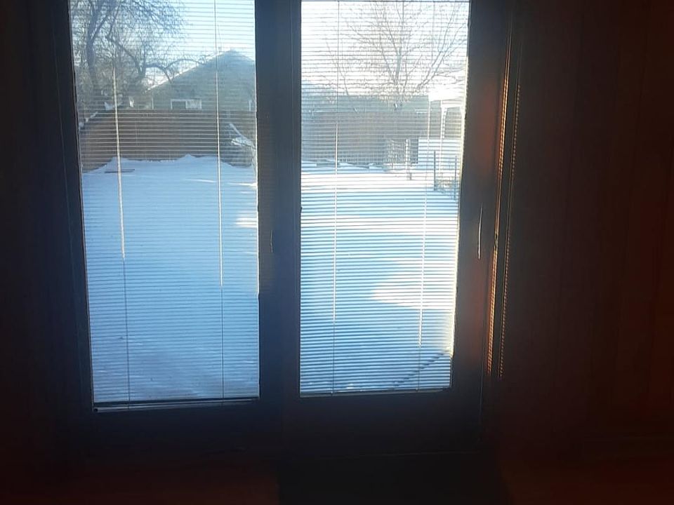 Livingroom slider goes out to private yard