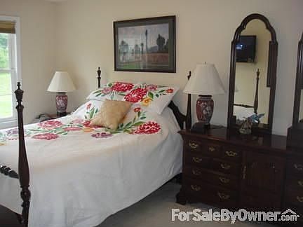 Finished Lower Level
						:
						Lower level has living area & huge storage room with workbench & shelves.