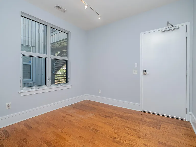 The front foyer/office. You can see the front patio through the window.