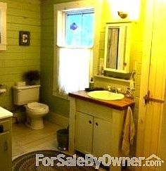 Full 1st floor bath
						:
						Laundry room for washer and dryer are found in closet with cottage style door