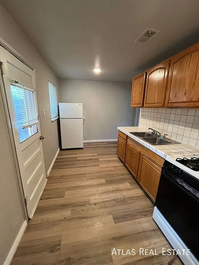 Coming Soon! | Updated 1 Bed, 1 Bath With Private Patio & Off-Street Parking! — Photo 4