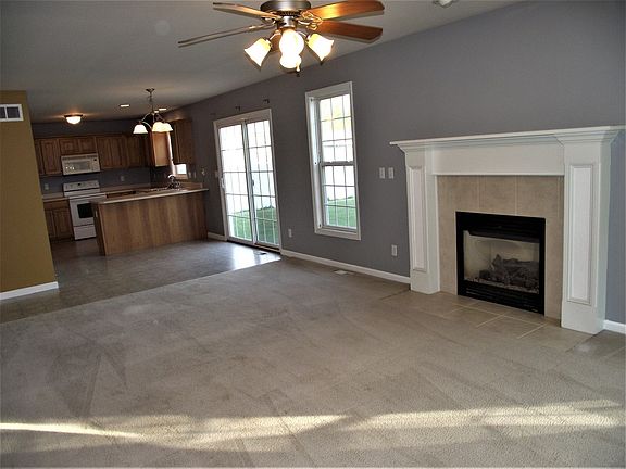 LARGE OPEN SPACE FROM FAMILY ROOM TO THE KITCHEN AND ALL FRESHLY PAINTED
