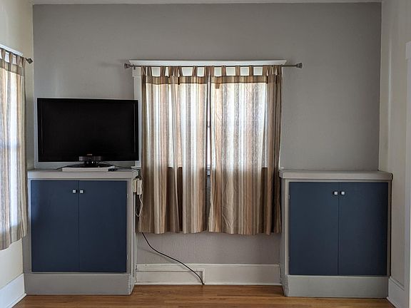 living room with built-in cabinets