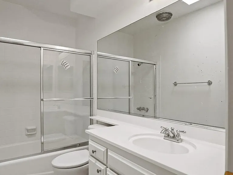 Bathroom with Bathtub with Glass Doors