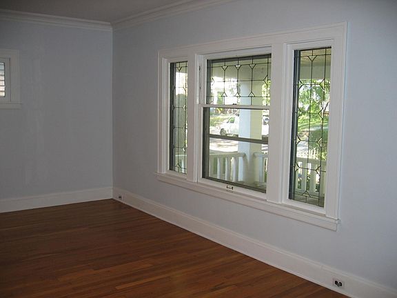Front living room window looking out onto porch