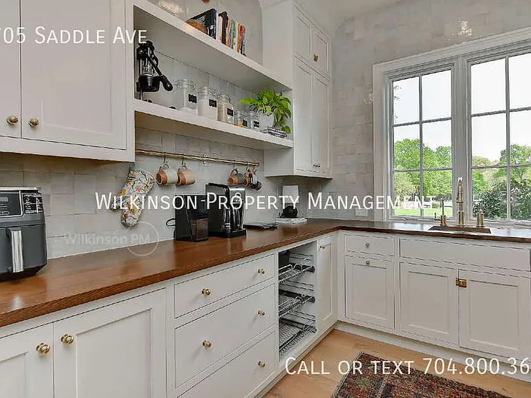 9705 Saddle Ave — Photo 36