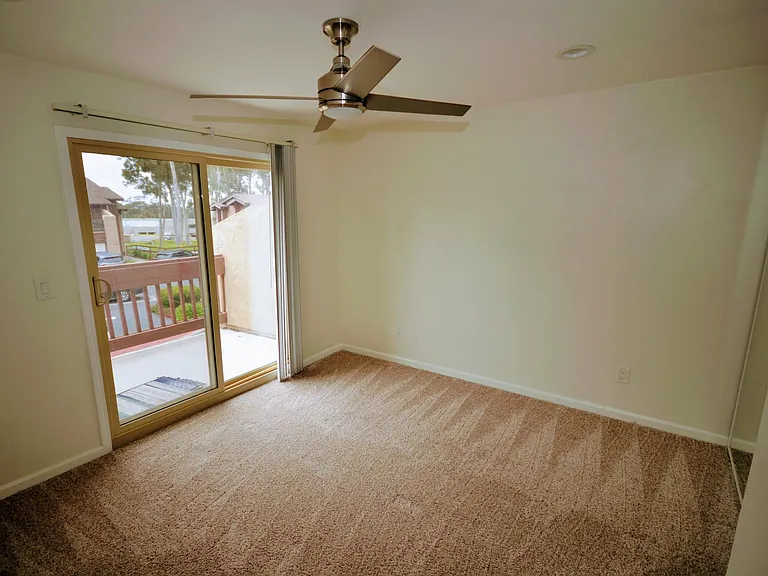 Upstairs bedroom with balcony