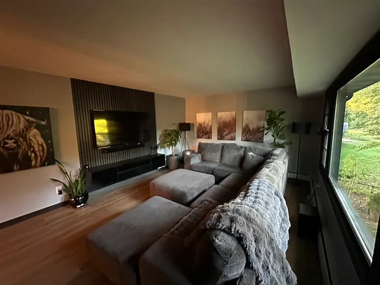 Large picture windows provide natural light to all areas of this home. TV and surround sound system come with this home.