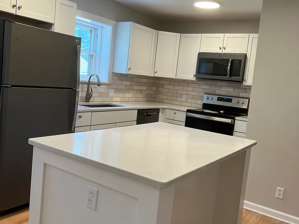 New kitchen cabinets and stainless steel appliances