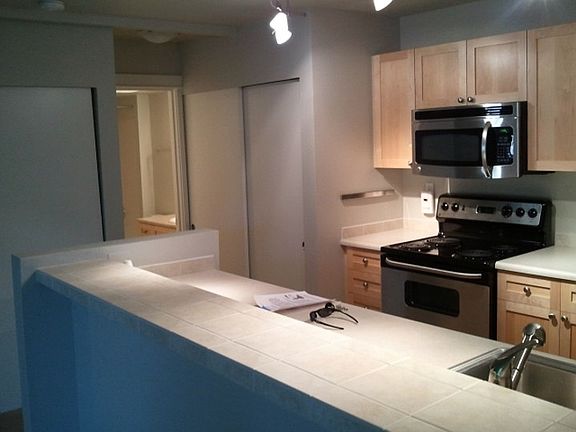 Kitchen looking towards laundry