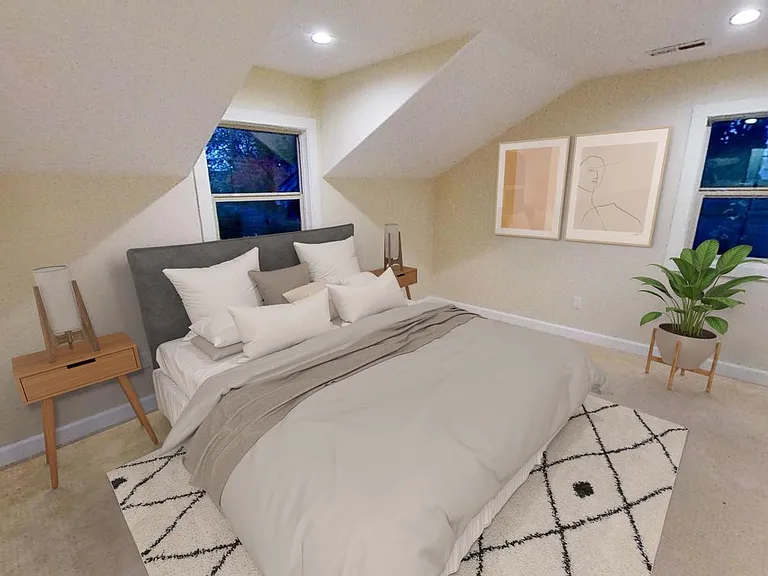 Bedroom 2. This image shows a virtually furnished space. Bedrooms come unfurnished.