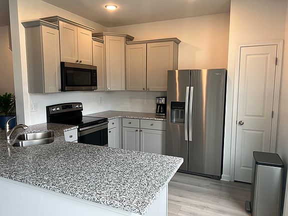 Granite countertops and stylish cabinets