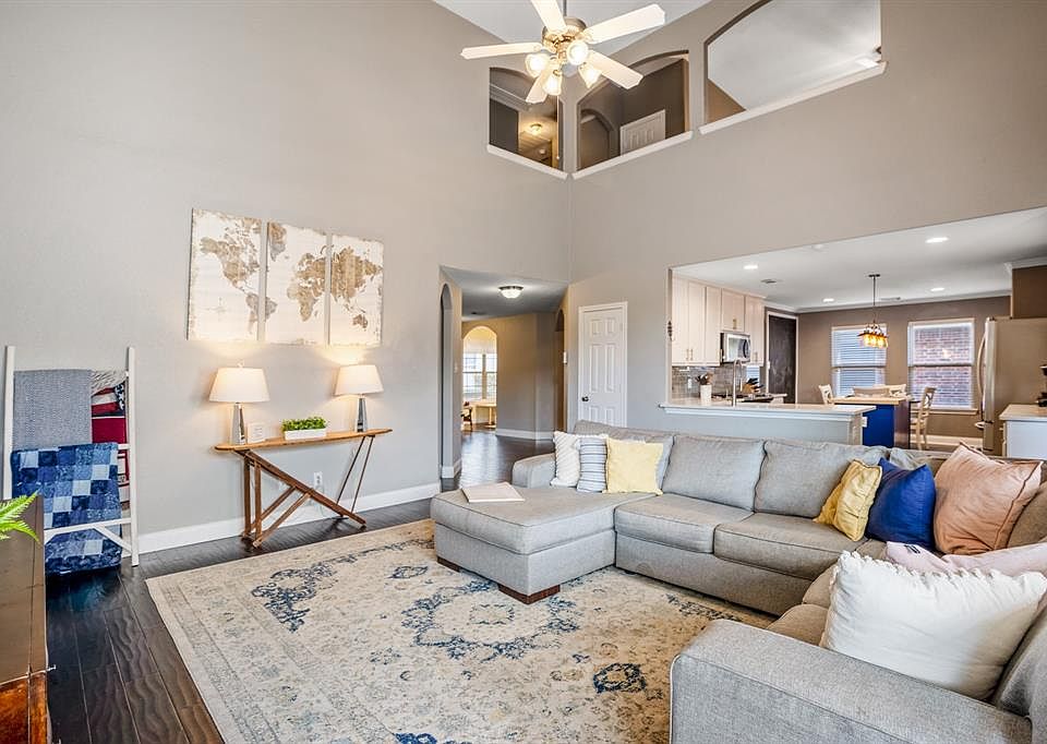 WELCOME HOME to this lovely 2-story home in the community of Northcrest Village! Here is a STUNNING look into the living room w/ it's open concept feel & high ceilings, but trust me, it gets better!