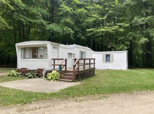 14365 S Wooded Acres, Sand Lake, MI 49343