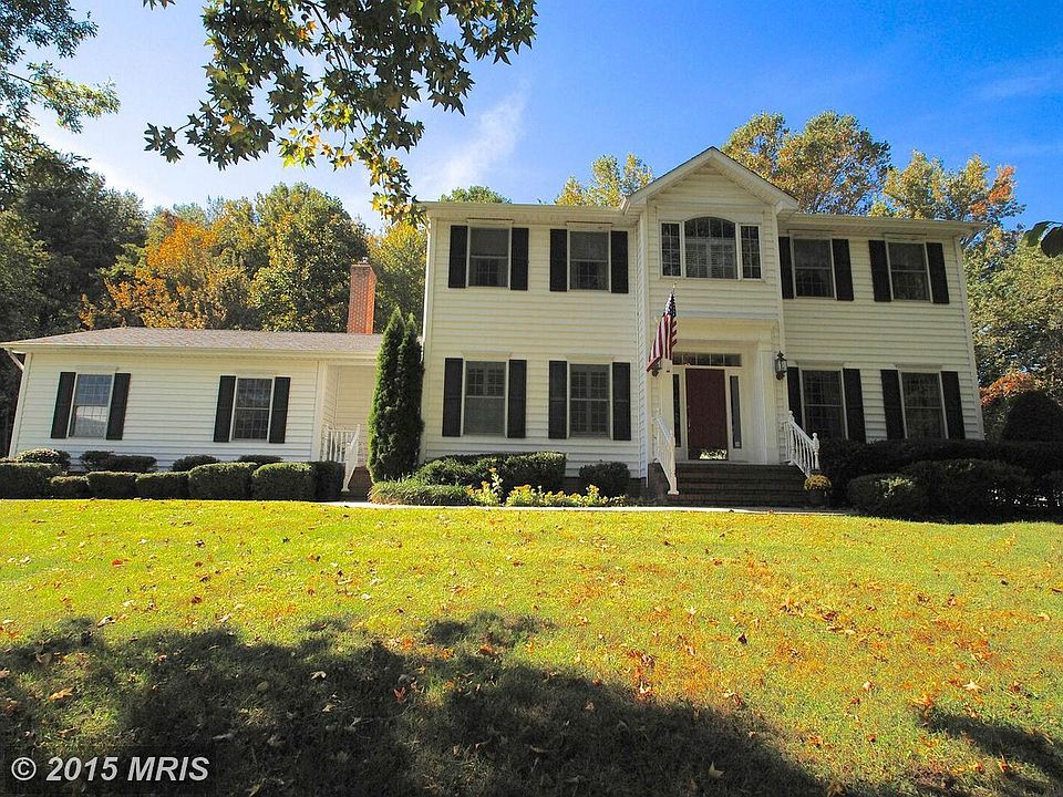 Lovely curb appeal and setting on 2 acres