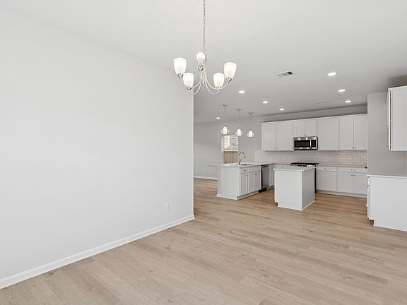 The Sparrow II-Dining Room into Kitchen