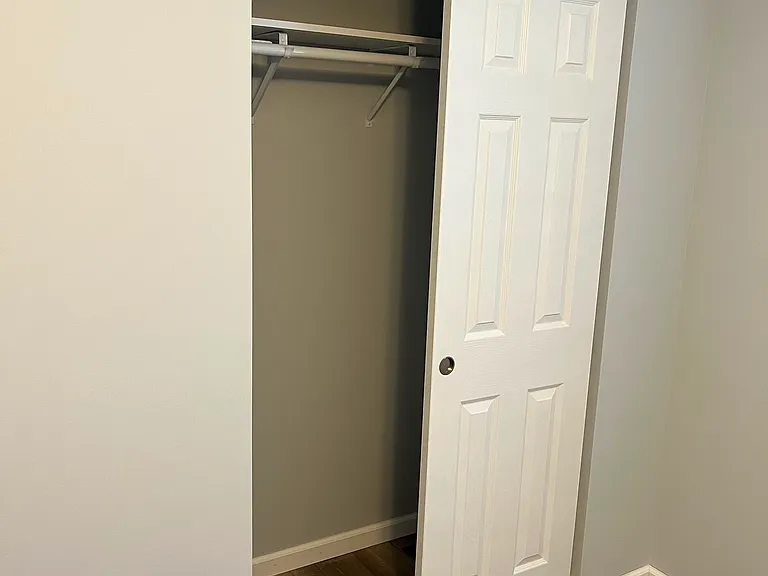 Closed space inside standard bedroom.
