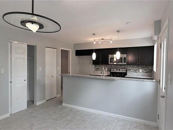 Kitchen, you can see the closet, pantry, and laundry room entrance