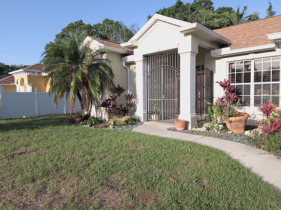 Walking up to front entrance of home.