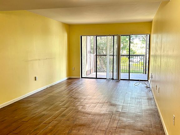 4th image of 10775 Village Club Cir #206