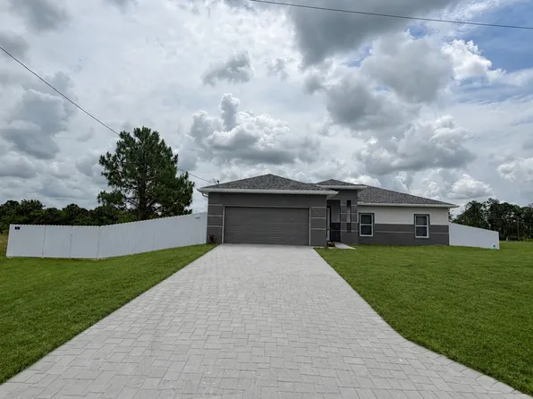 395 Chalet Ave S, Lehigh Acres, FL 33974