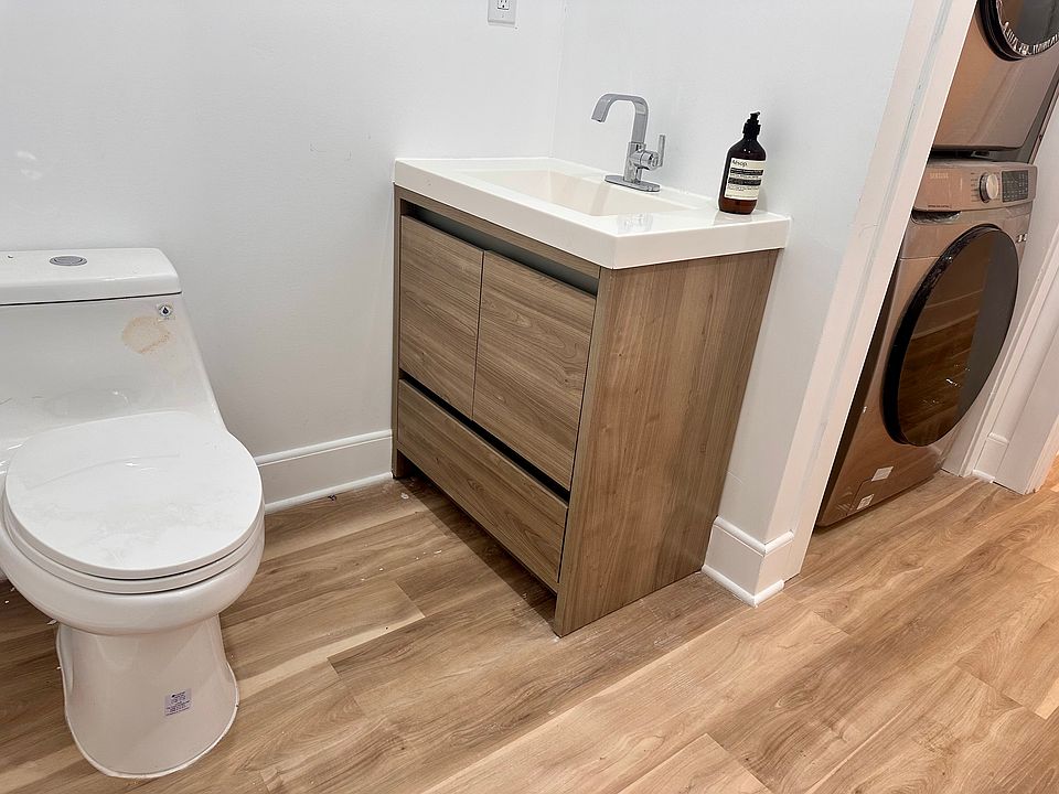 Half bath - laundry space - washer/dryer.