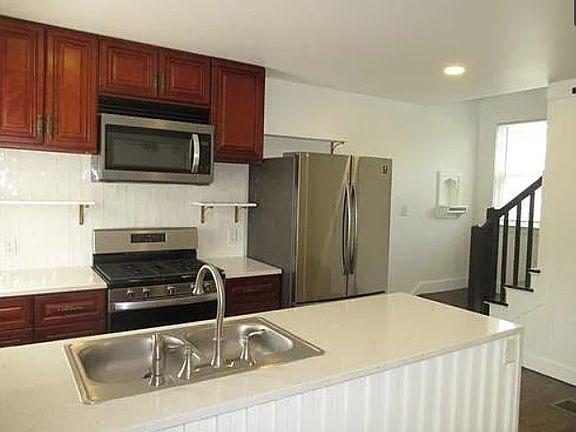 Gas stove and above-the-range microwave