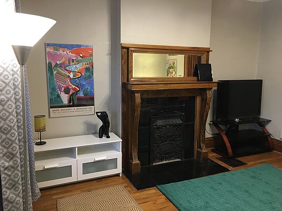 View fro, front door to fireplace